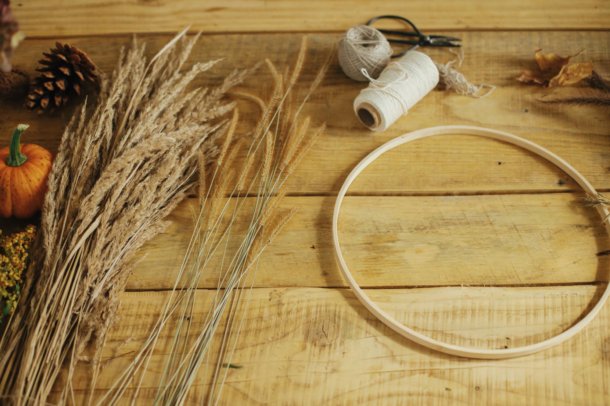 Large editorial shot of embroidered textile on wooden table